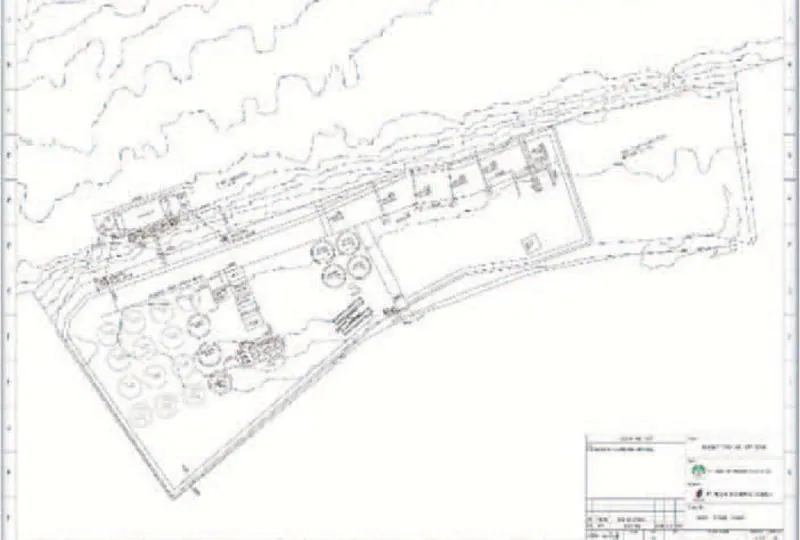 Engineer reviewing a site survey plan for PT Rexline Engineering Indonesia geotechnical services (view 5)