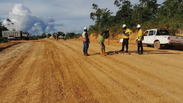 Road roller compacting a hauling road under supervision by PT Rexline Engineering Indonesia (view 3)