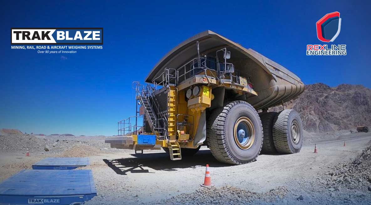 Truk angkut tambang di atas weigh pad untuk sistem penimbangan tambang, rel, dan jalan raya